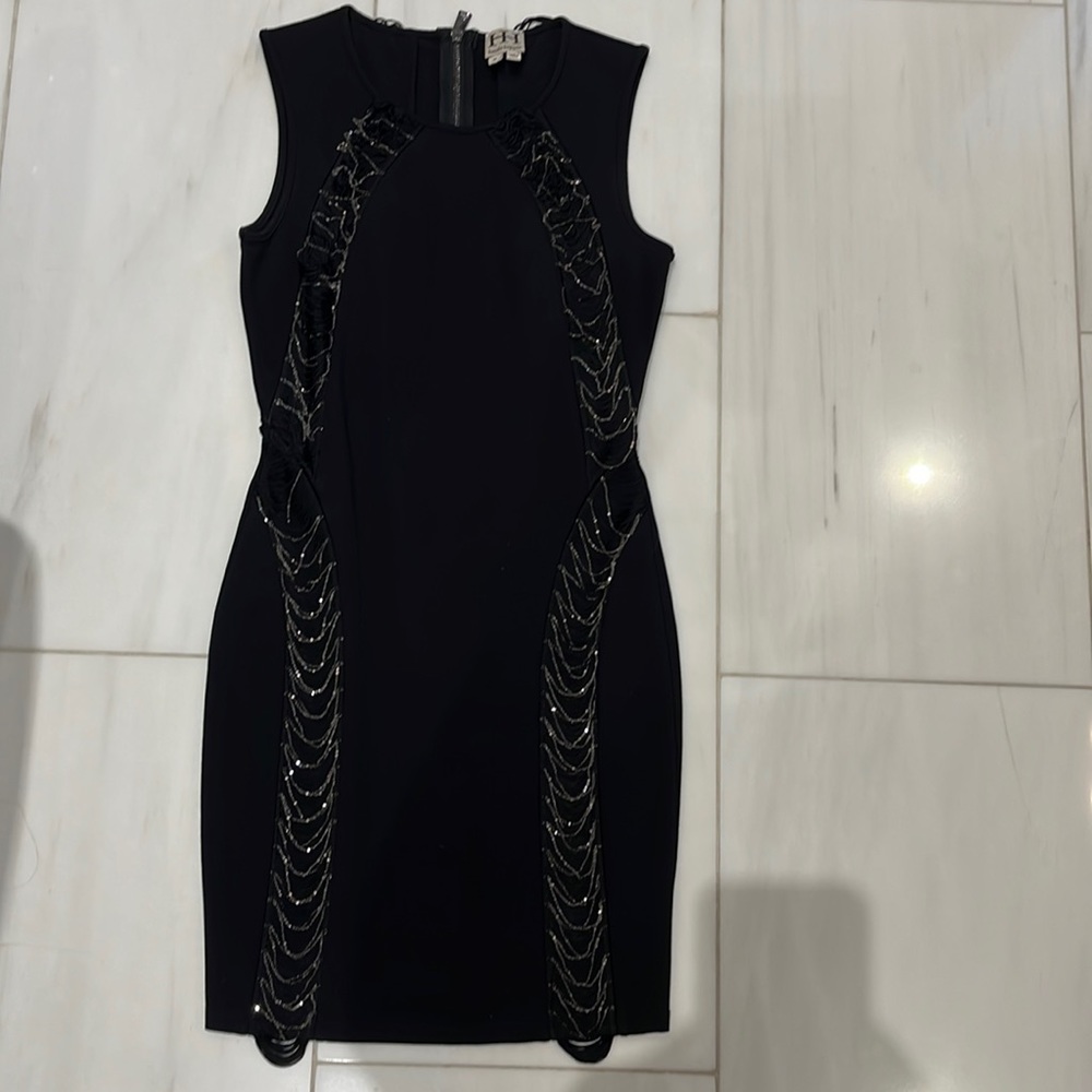 Black Haute Hippie sleeveless dress with cool chain details on front and back.